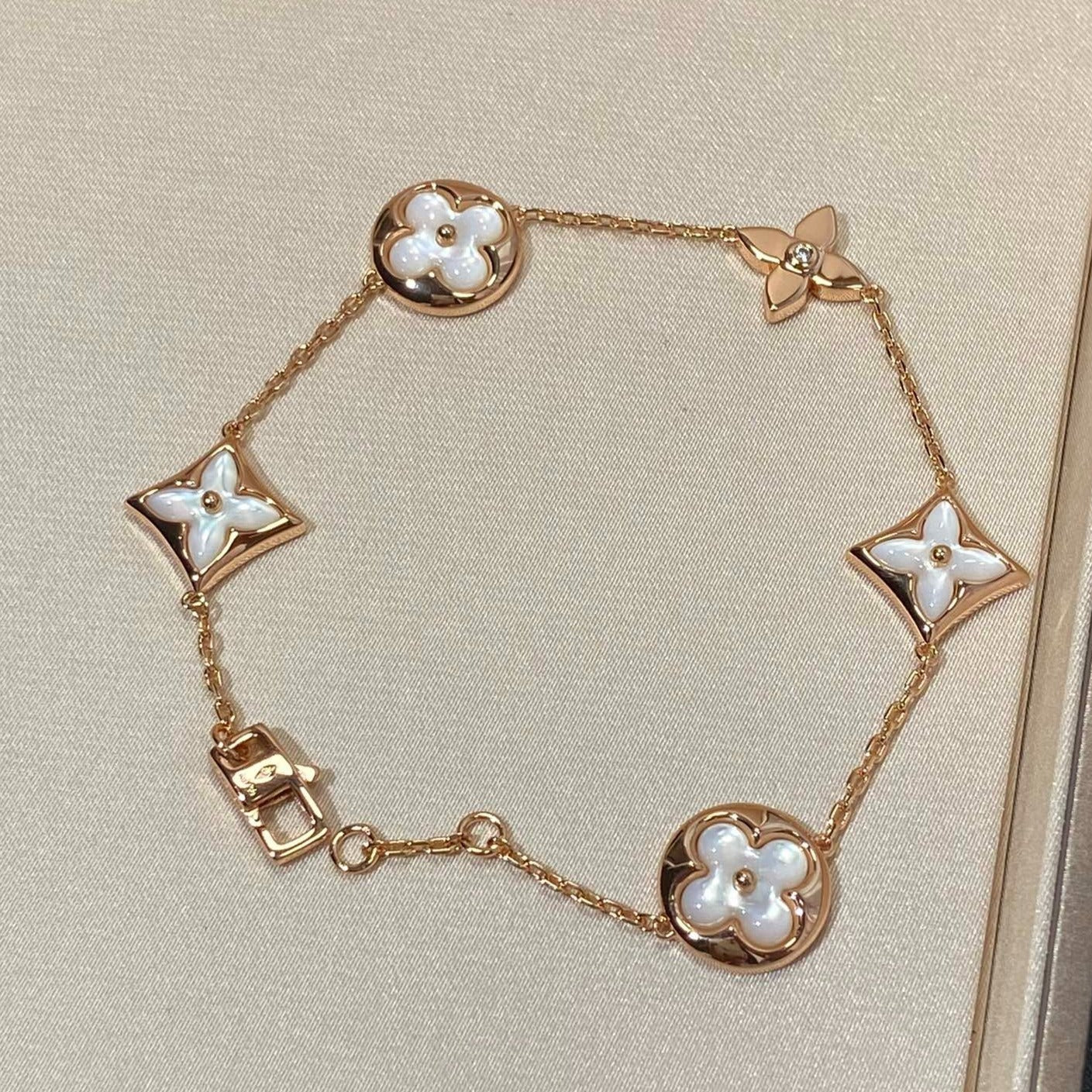[Everoly JW]STAR AND SUN 5 MOTIF MOP PINK GOLD BRACELET